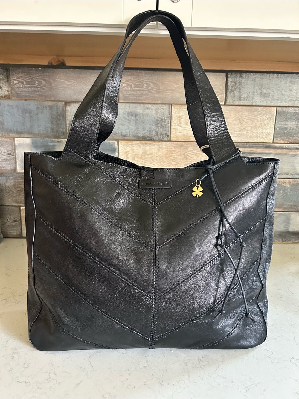 NWT Lucky Brand Genuine Leather Sash Tote in Black Chevron